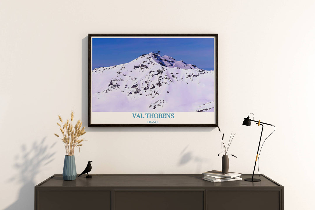Scenic travel poster of Val Thorens featuring the towering peak of Cime Caron, capturing the majestic beauty of the French Alps. Perfect for adding a touch of alpine charm to your home decor.