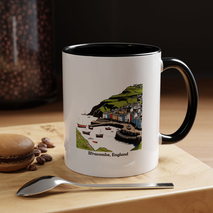 A ceramic Ilfracombe England Mug showcasing vibrant artwork inspired by the coastal town’s stunning scenery. This dishwasher-safe mug is perfect for coffee or tea and makes a wonderful keepsake or gift.