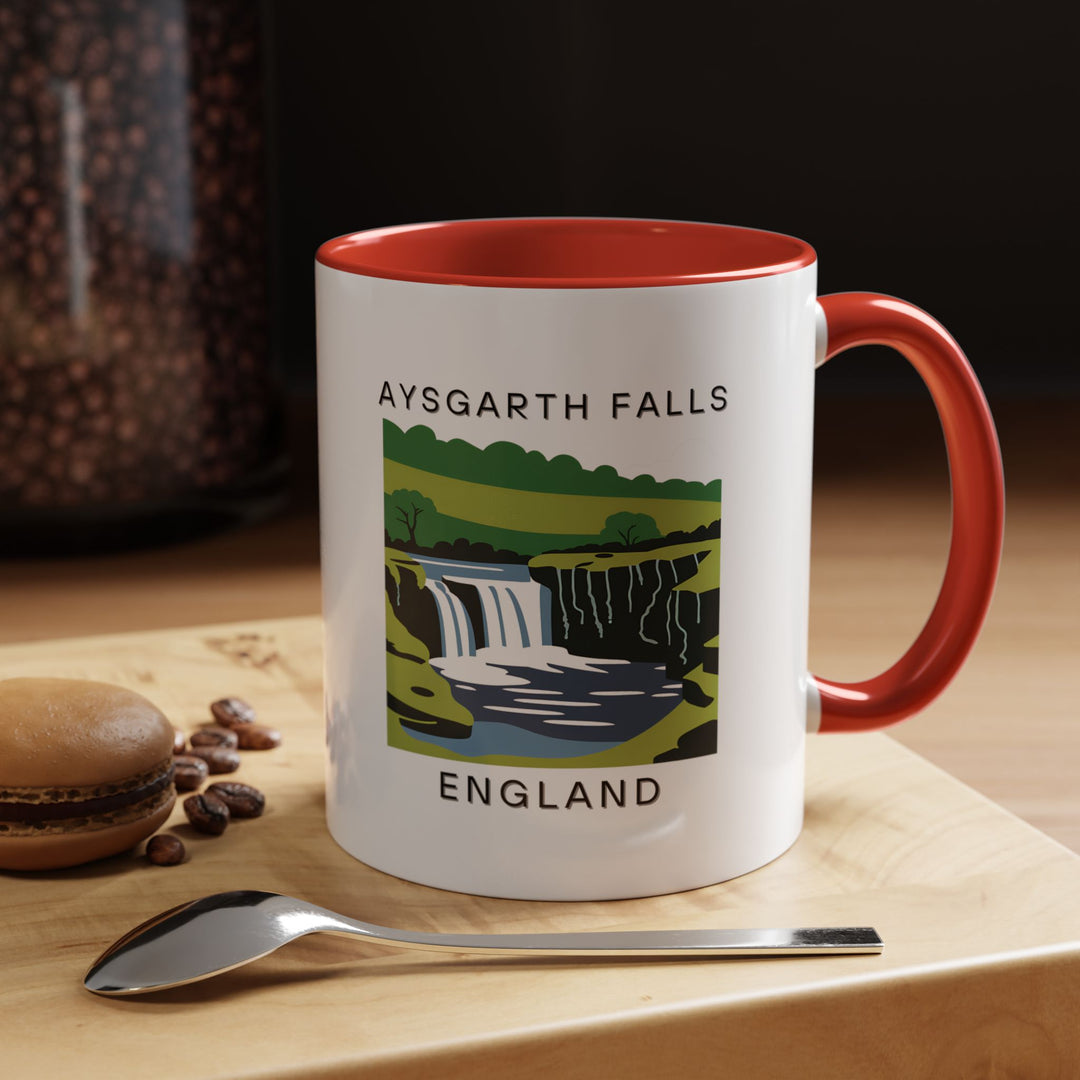 Celebrate the beauty of Aysgarth Falls with this stylish mug. Featuring artwork of the stunning falls, this ceramic mug is perfect for your favorite hot drinks. Dishwasher safe and microwave safe, it makes a great gift or keepsake for nature lovers.