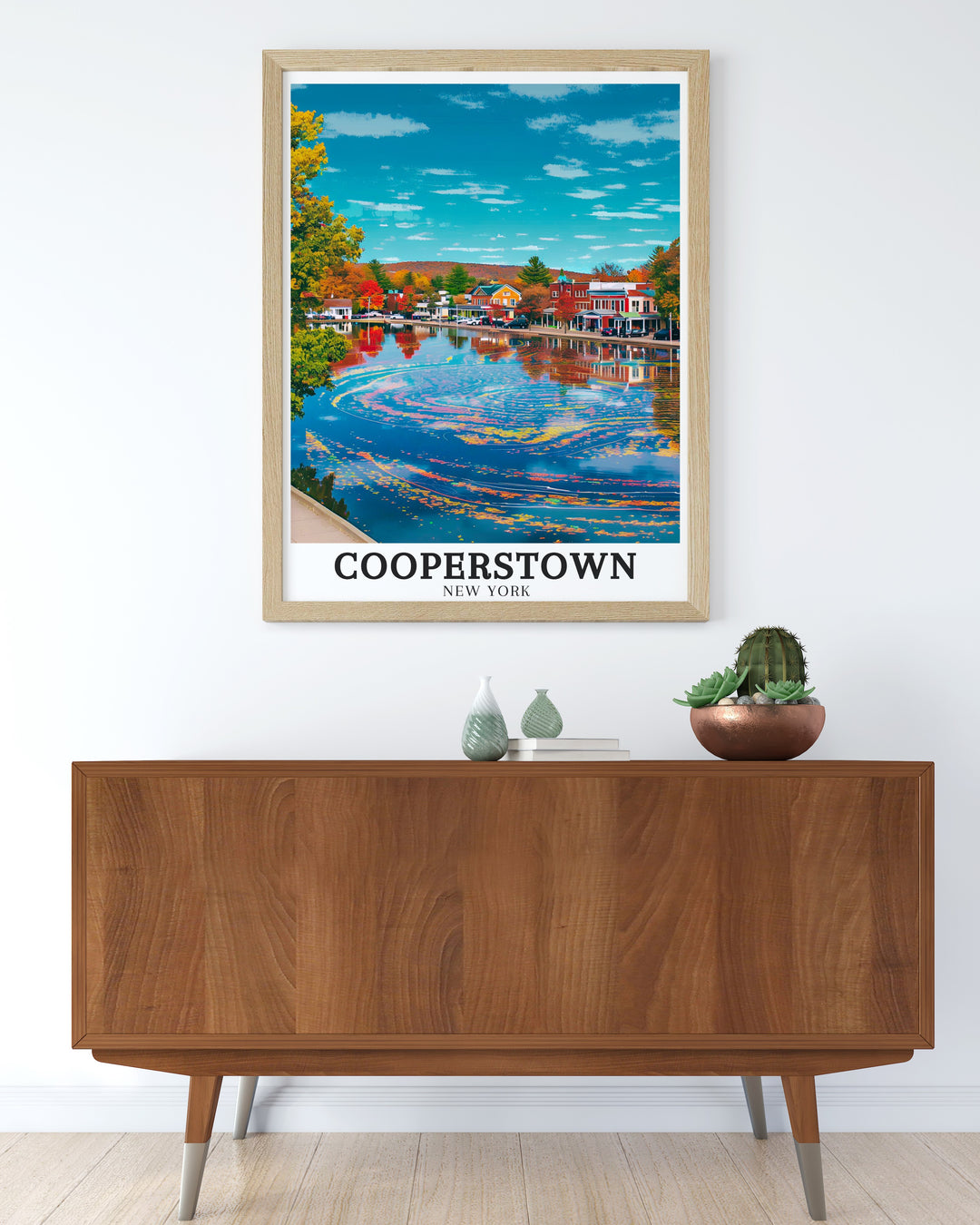 Celebrate the historical and natural wonders of Cooperstown with this framed art, featuring the iconic downtown area and Otsego Lake. A great addition for those who love New Yorks countryside and peaceful lake views.