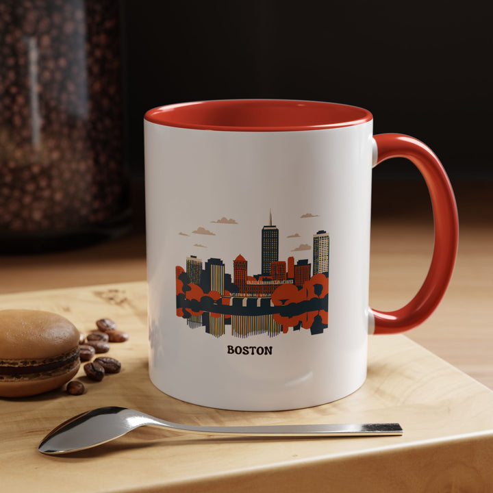 A durable Boston Mug crafted from ceramic and featuring detailed artwork inspired by Boston's unique culture. This dishwasher and microwave-safe mug is a practical and artistic choice for coffee or tea lovers.