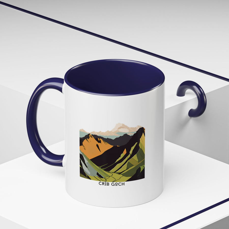 A ceramic Crib Goch mug with intricate artwork inspired by Snowdonia’s landscapes. Durable and dishwasher safe, it is both stylish and practical, making it a great gift or keepsake for travelers and coffee enthusiasts alike.