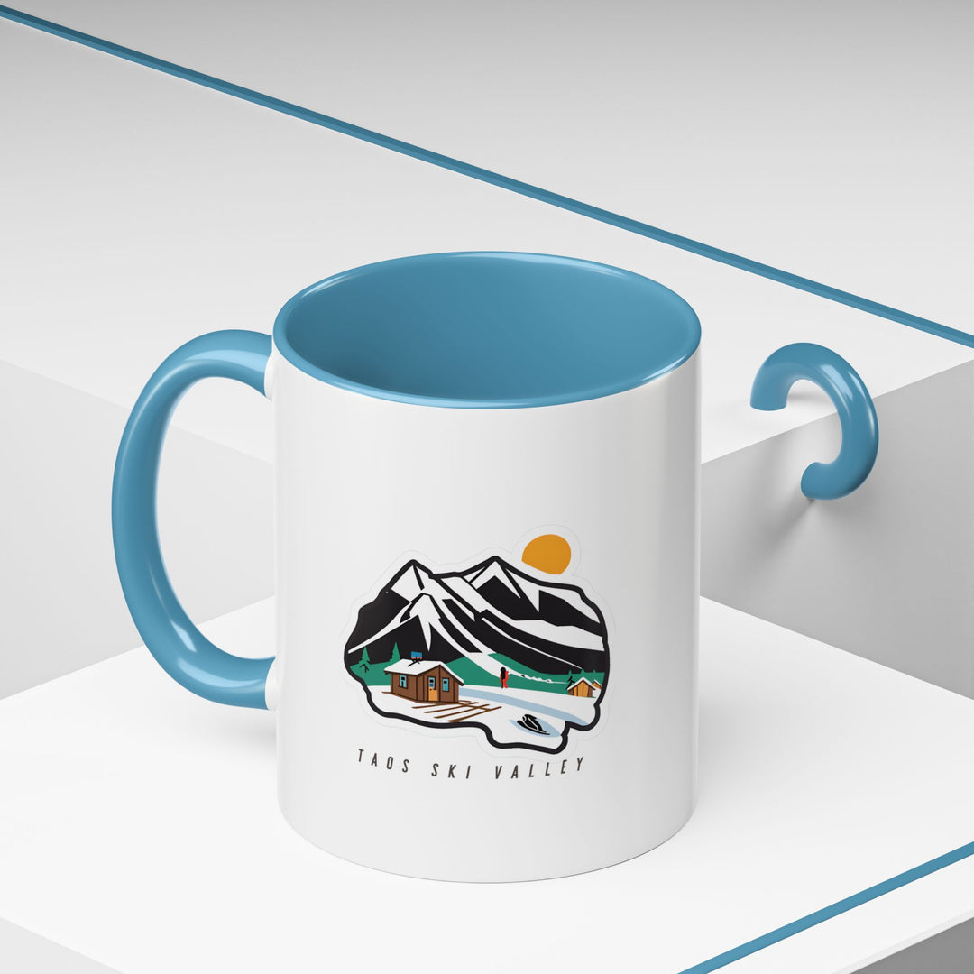 Celebrate the spirit of Taos with this mug featuring vibrant images of the region's cultural highlights and natural wonders. Dishwasher and microwave safe, made from durable ceramic, ideal for coffee or tea lovers seeking a unique and artistic mug.