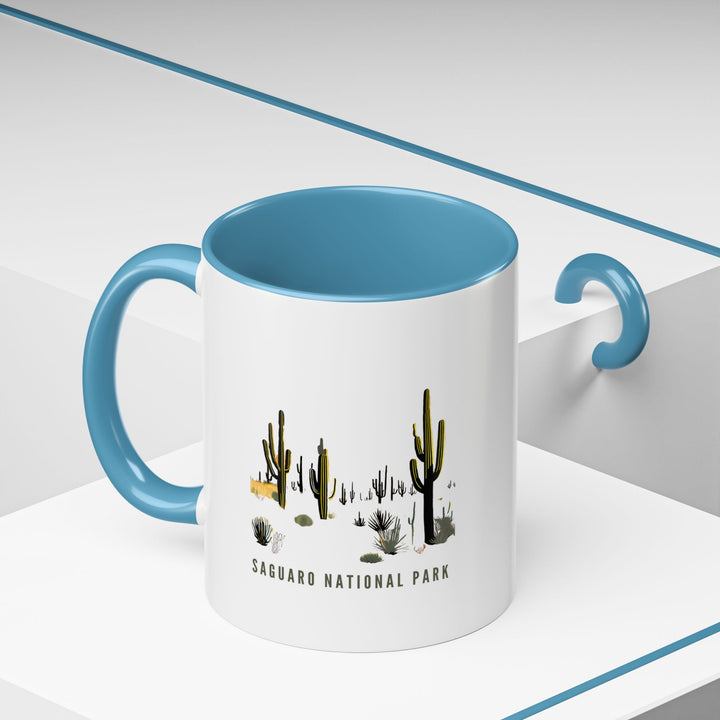 This Saguaro National Park mug combines artistic beauty with practical functionality. Featuring vibrant designs of desert landscapes and cacti, it is made from high-quality ceramic. Dishwasher and microwave safe, it is ideal for coffee and tea lovers seeking a touch of nature.