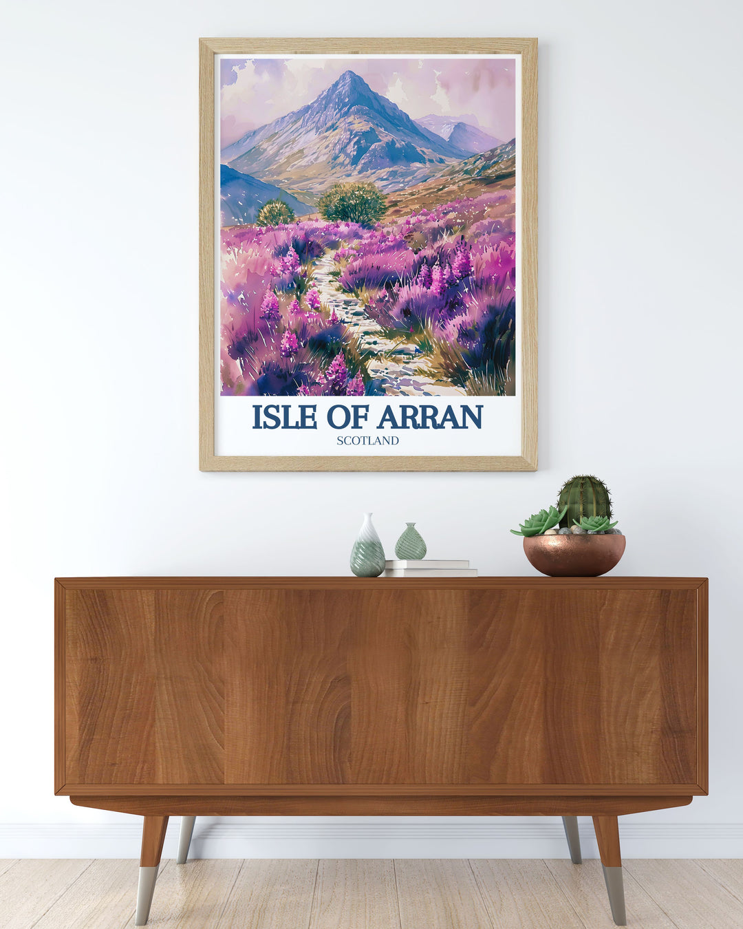Vintage poster of the Isle of Arran, showcasing the islands rich heritage and stunning natural beauty, with a focus on the iconic Goatfell and tranquil Glen Rosa.