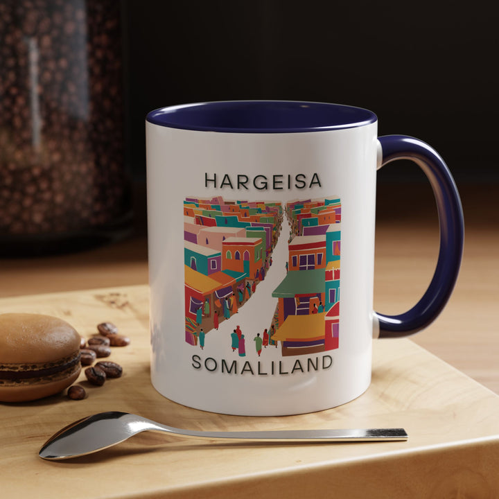 Celebrate the beauty of Hargeisa with this stylish mug. Its detailed artwork inspired by the city’s landmarks makes it a standout addition to any collection. Dishwasher-safe and durable, it is perfect for gifting or personal use.