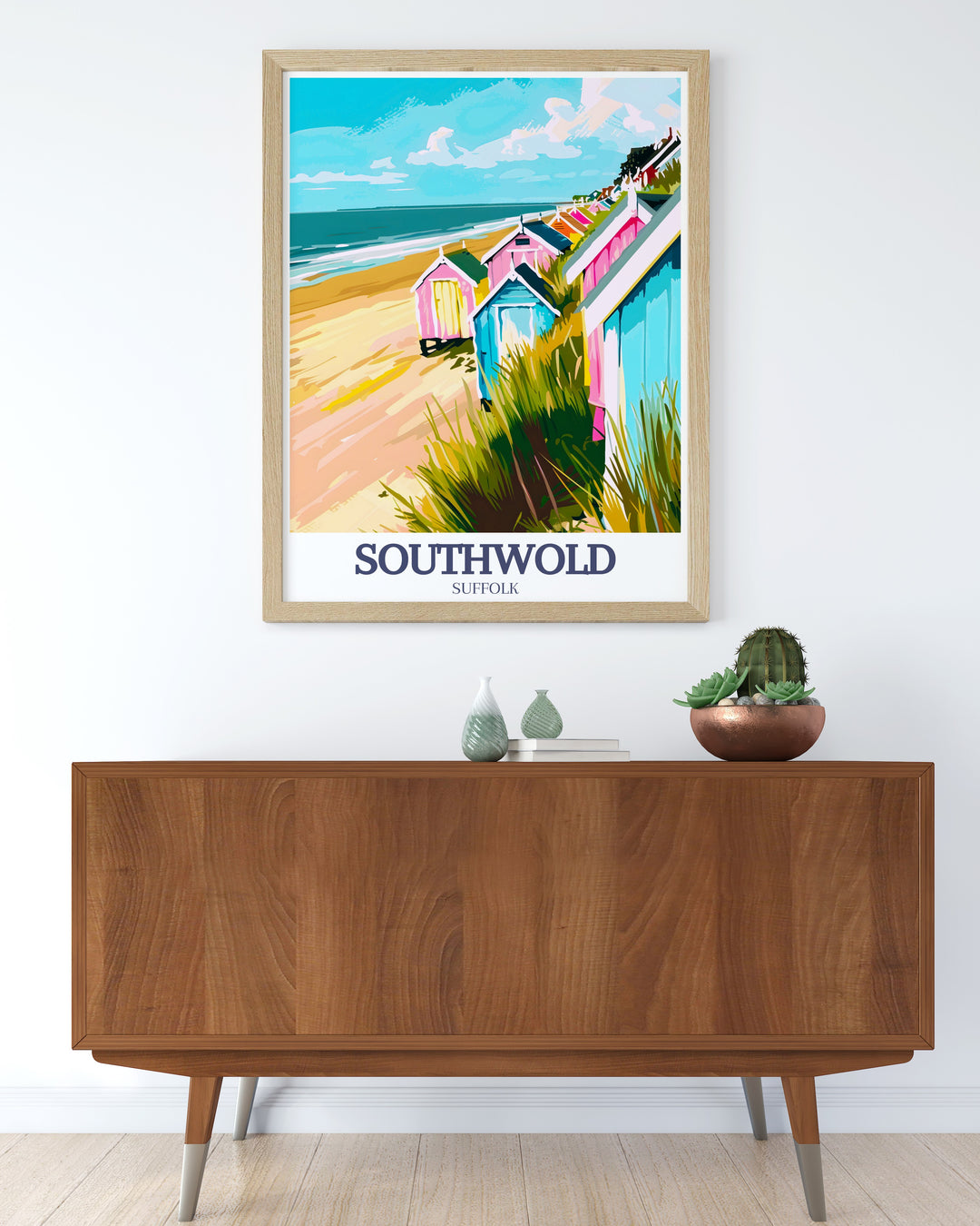 Vintage Travel Print featuring the scenic Southwold Pier and North Sea Southwold beach. This artwork is perfect for those who appreciate coastal beauty and want to bring a piece of Southwold into their home. Ideal for modern and vintage decor.