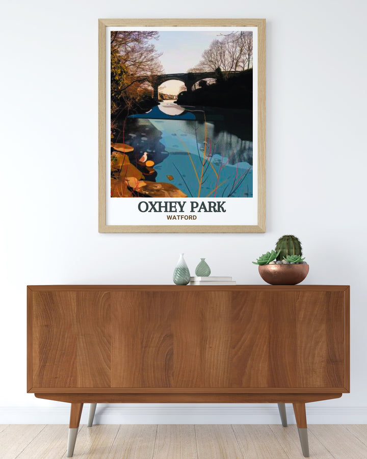 River Colne Stunning Prints offer a beautiful and calming depiction of Watfords River Colne surrounded by the lush greenery of Oxhey Park making it a perfect choice for those looking to enhance their living space with nature inspired artwork.