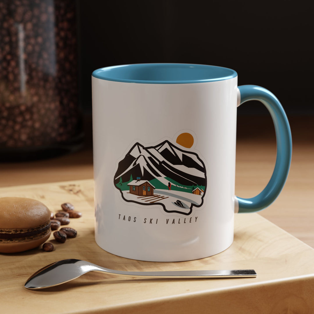 Experience the beauty of Taos Ski Valley with this elegant mug showcasing detailed illustrations of iconic ski trails and mountain vistas. Made from durable ceramic, dishwasher and microwave safe, ideal for daily use or as a thoughtful gift for fans and collectors.