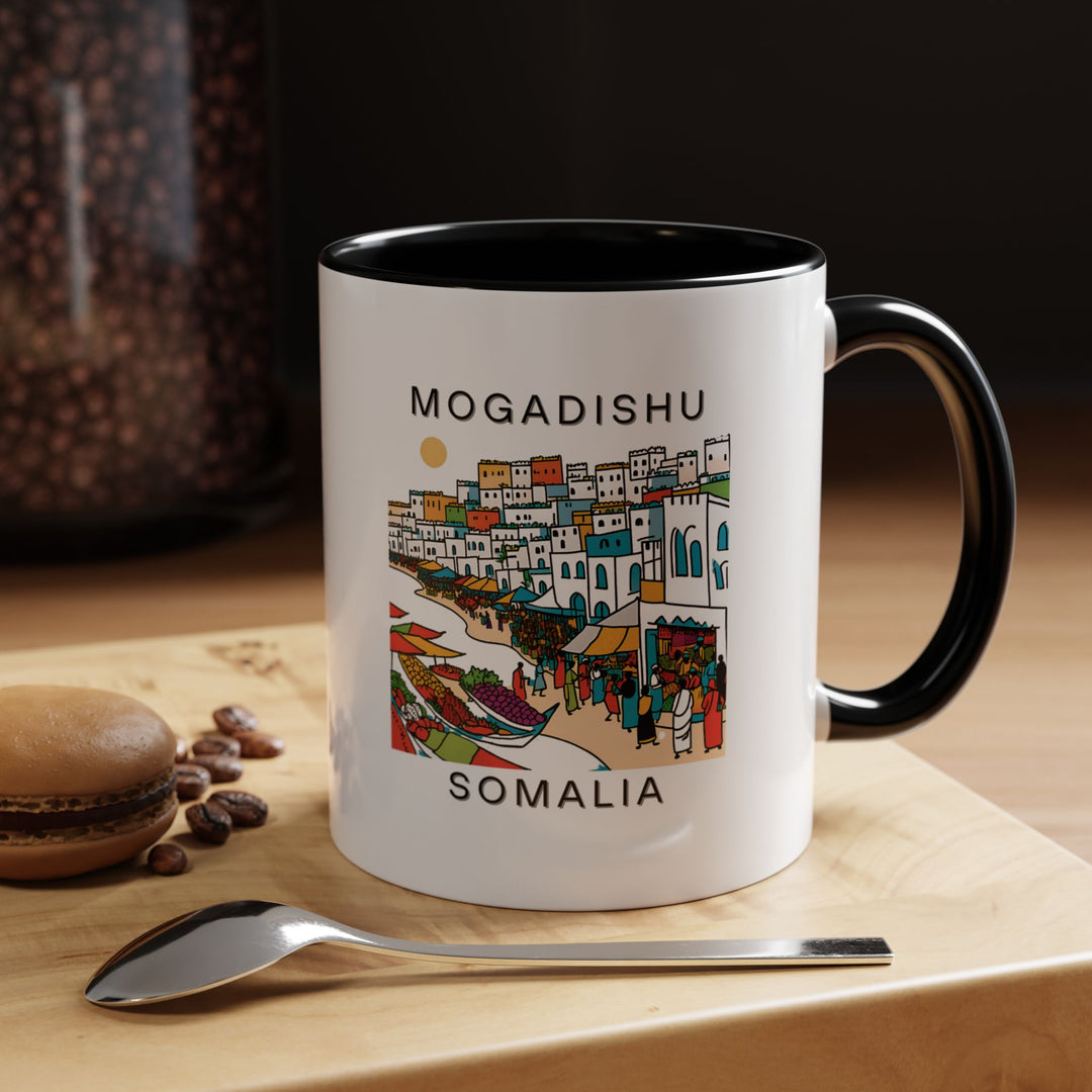 Enjoy your coffee or tea with this Mogadishu Somalia mug, featuring detailed artwork of the city’s landscapes. Ideal for lovers of Somalia’s culture, this mug is microwave and dishwasher safe, making it both functional and beautiful for daily use.