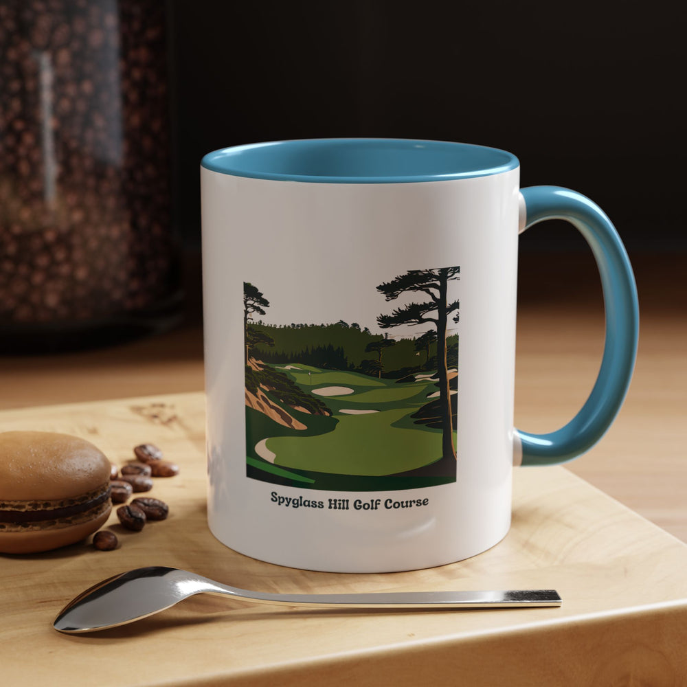 A ceramic Spyglass Hill Golf Course Mug featuring vibrant artwork inspired by lush greens and coastal landscapes. This durable and microwave-safe mug makes a perfect keepsake for travelers and golf lovers.