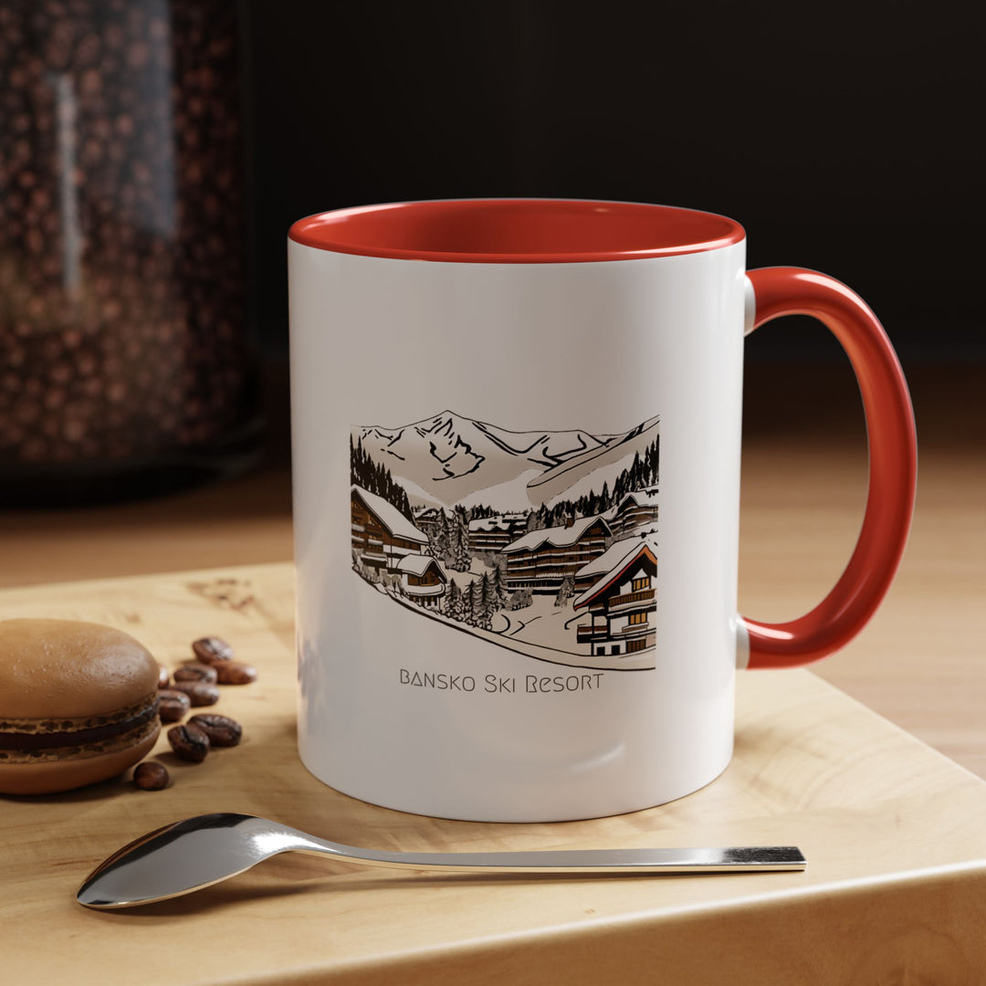 Enjoy the charm of winter with this Bansko Ski Resort mug featuring intricate snowy landscape designs. Made from durable ceramic, it is dishwasher and microwave safe, perfect for gifting or personal use.