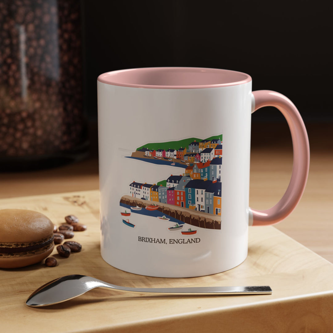 A vibrant Brixham England mug showcasing the beauty of Brixham’s coastline. Ideal for coffee or tea, this mug features artwork of the town’s harbor and scenic views. Durable and dishwasher safe, it’s a great gift or keepsake for those who love Brixham.