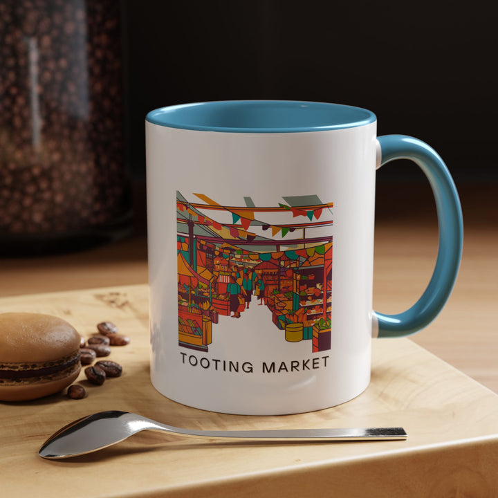 A beautifully designed Tooting Market mug celebrating Londons charm. Perfect for coffee or tea lovers, it features vibrant artwork inspired by Tooting Market culture. Durable and dishwasher safe, this mug is a meaningful gift or keepsake for travelers and art enthusiasts.