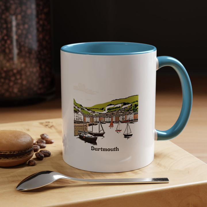 A vibrant Dartmouth Mug with intricate designs reflecting the scenic beauty and historic allure of Dartmouth. Made from durable ceramic and dishwasher-safe, this mug is perfect for coffee enthusiasts and as a meaningful gift or keepsake.