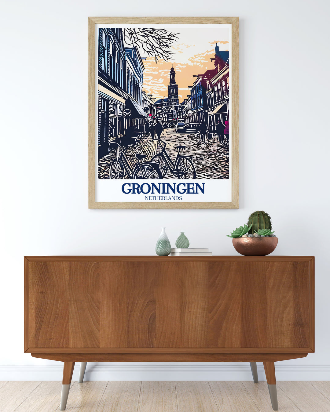 Martini Tower wall art showcasing the picturesque view of Groningens historic skyline, with the tower as the focal point. This print captures the tranquility and architectural beauty of one of the Netherlands most beloved cities, making it a perfect addition to any decor.