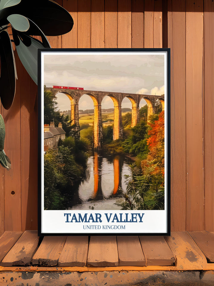 Elevate your interior decor with the Calstock Viaduct and Morwell Rocks framed print. This Tamar Valley poster is a beautiful addition to any room, showcasing the iconic viaduct and majestic Morwell Rocks in vibrant colors and intricate detail.