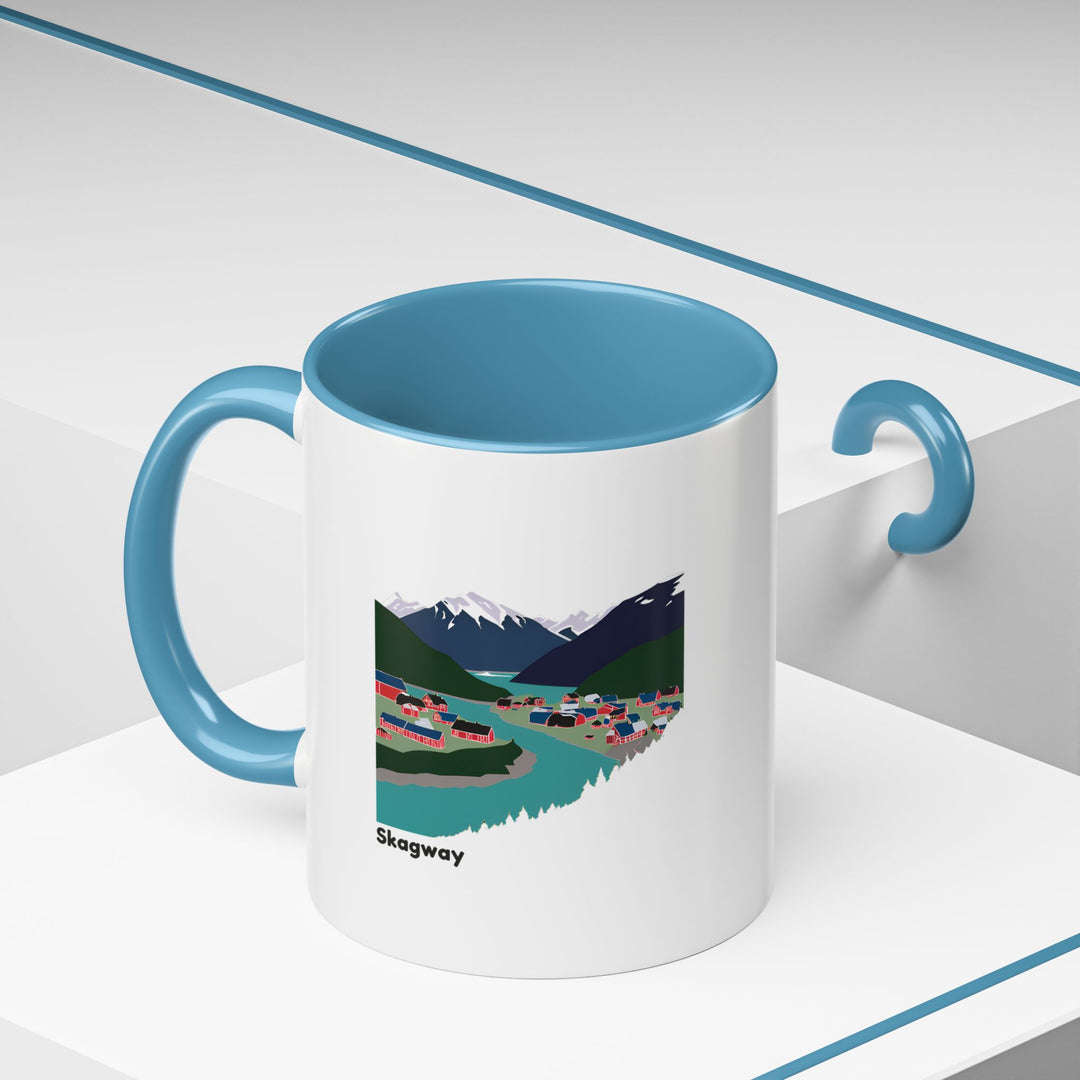 A ceramic Skagway Alaska Mug inspired by the iconic Alaskan landscape. Dishwasher-safe and microwave-safe, it is a durable and artistic gift option for nature and coffee lovers.