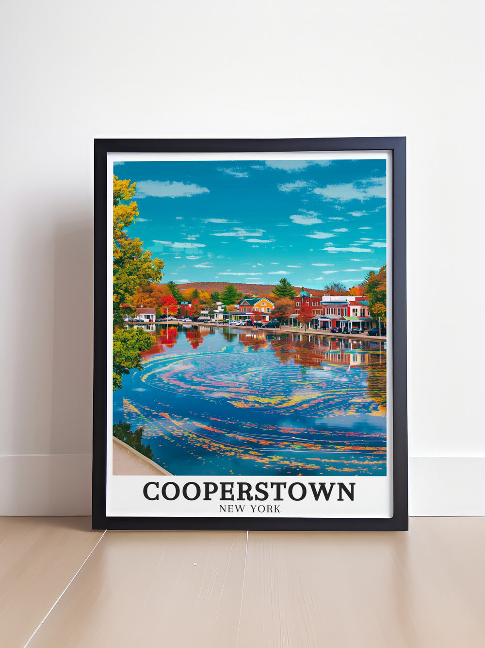 This Cooperstown poster print showcases the peaceful beauty of Otsego Lake, with the charming downtown area in the distance. A perfect piece for New York State lovers and anyone looking to add a serene landscape to their home decor.