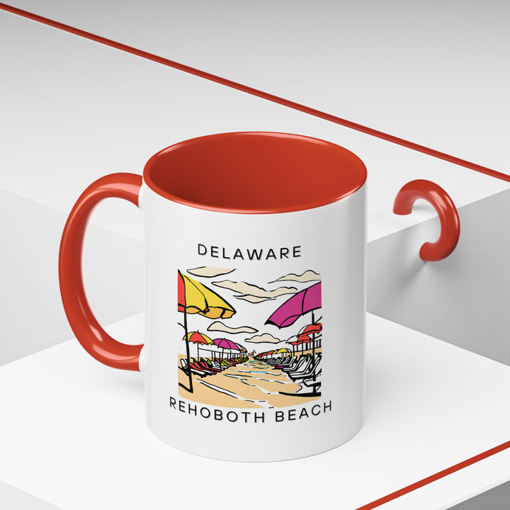 Capture the beauty of Rehoboth Beach with this ceramic mug. Featuring vibrant artwork of the beach, it’s perfect for sipping coffee, tea, or any other beverage. Durable and easy to care for, it’s the perfect gift for beach lovers and Rehoboth Beach fans.