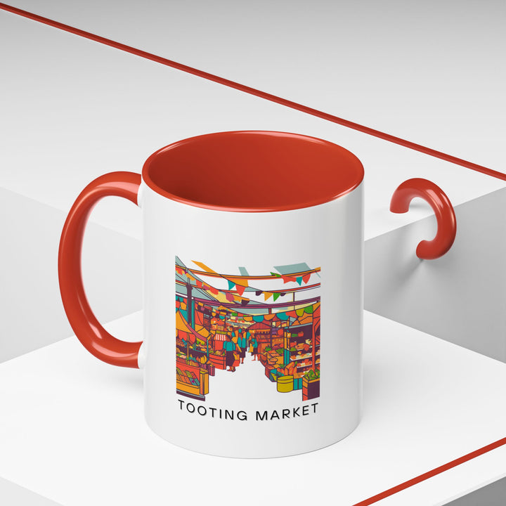 Bring home a piece of Tooting Market with this beautifully crafted mug. Featuring intricate artwork, it is made from durable ceramic and is dishwasher and microwave safe. A perfect gift or personal treasure for those who cherish Londons unique marketplaces.