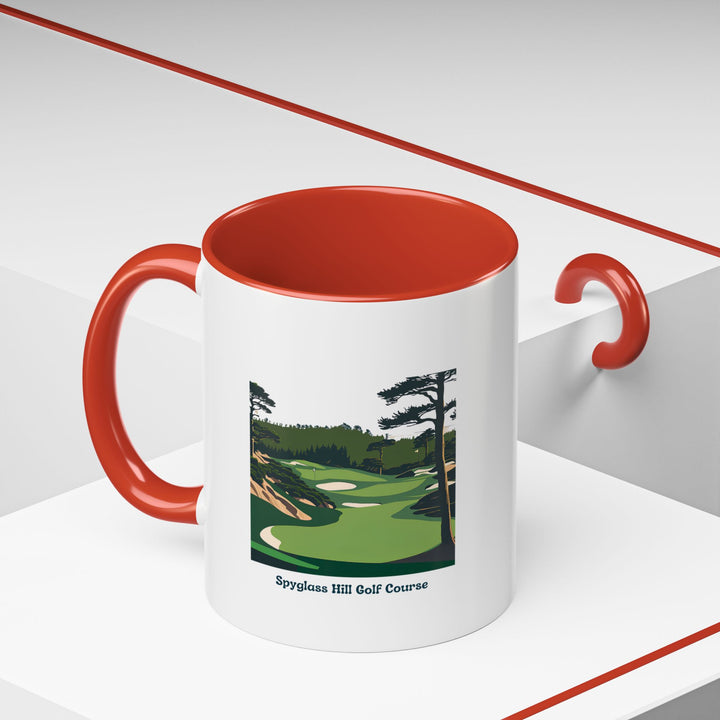 A Spyglass Hill Golf Course Mug with a colored rim, handle, and interior. Its artistic design inspired by the golf course's lush landscape makes it an exceptional gift for golf lovers and travelers.