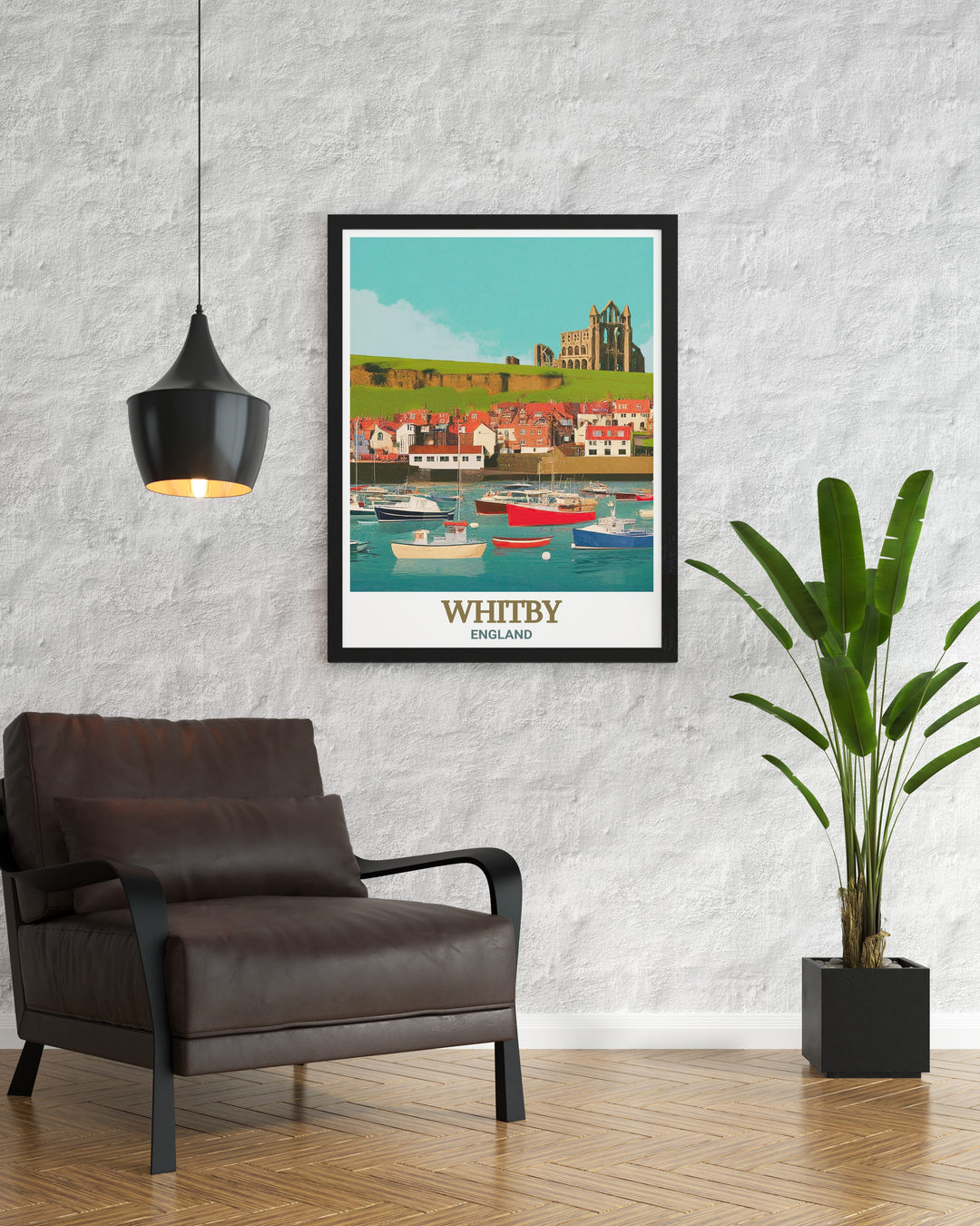 A Whitby Harbour travel print that captures the golden hour light over the harbour, with Whitby Abbey looming in the distance. This artwork brings the peaceful beauty and historical depth of Whitby into your home, ideal for coastal themed decor.