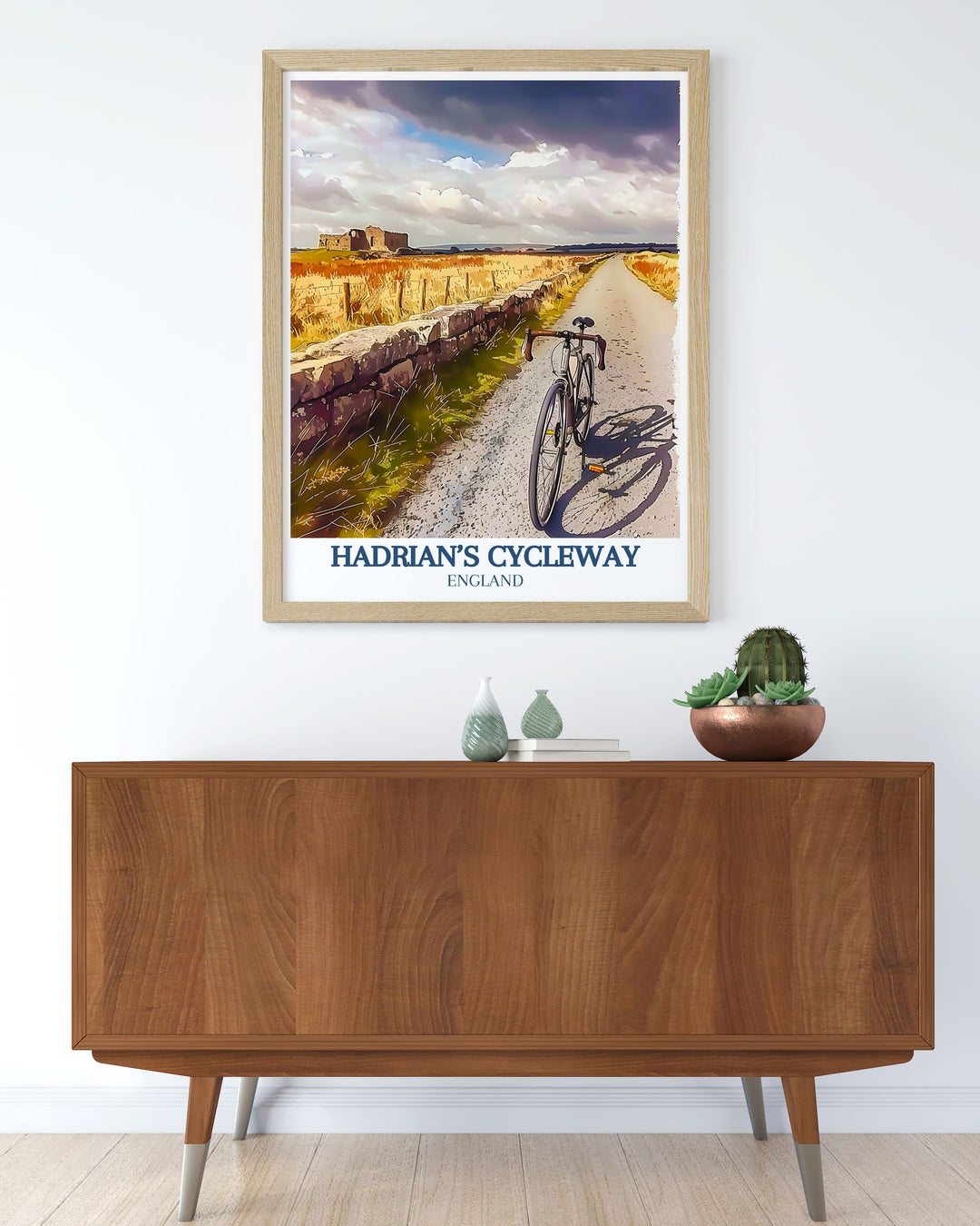This travel poster of Hadrians Cycleway captures the scenic vistas and historic landmarks, making it a captivating addition to any wall art collection for those who love cycling and history.