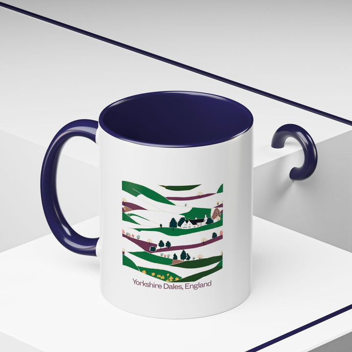 Celebrate the spirit of Yorkshire Dales with this mug featuring rich images of the regions cultural highlights. Dishwasher and microwave safe, made from durable ceramic, it is ideal for coffee and tea lovers seeking a unique and artistic mug that captures Yorkshire Dales essence.