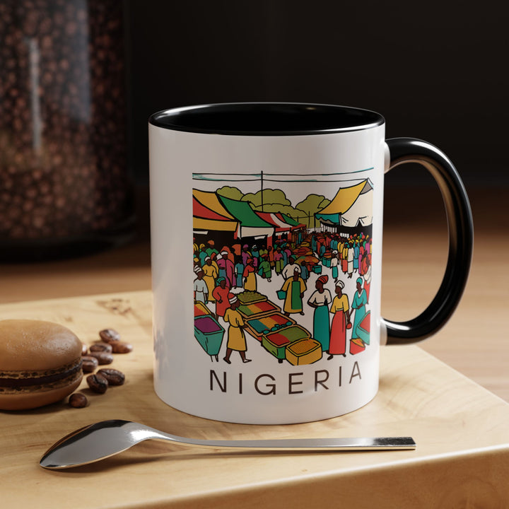 A Nigeria mug crafted with premium ceramic, featuring detailed artwork that highlights Nigeria's cultural essence. Dishwasher and microwave safe, it makes an ideal keepsake or practical beverage companion.