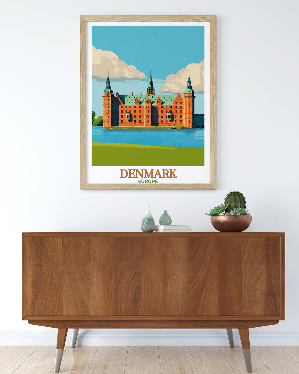 This London travel poster highlights the serenity of Ruskin Park and its bandstand in Camberwell with the addition of Frederiksborg Castle for a unique combination of two historical landmarks ideal for your home decor or a thoughtful art gift