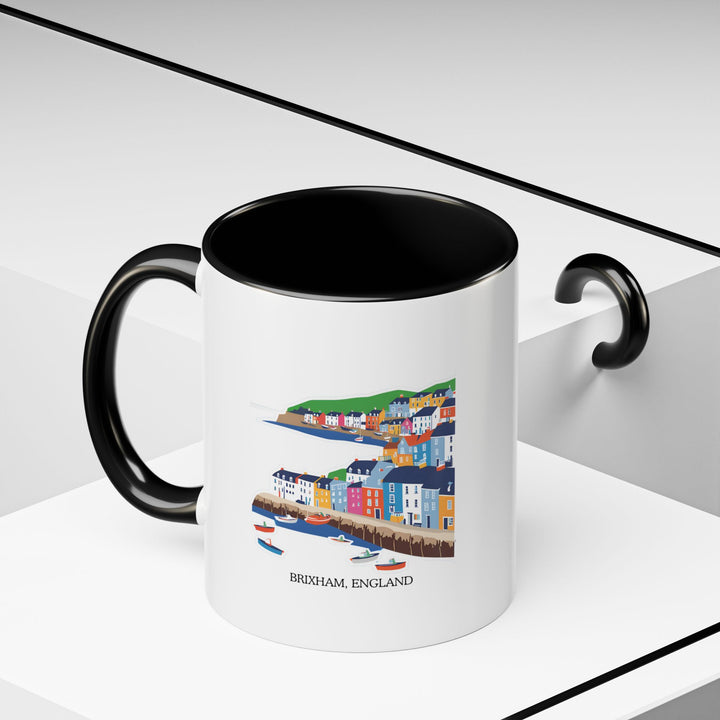 Capture the scenic beauty of Brixham with this stylish mug. Featuring vibrant artwork of the town’s harbor, this mug is perfect for coffee or tea. Durable and microwave safe, it is a practical and artistic addition to any kitchen.