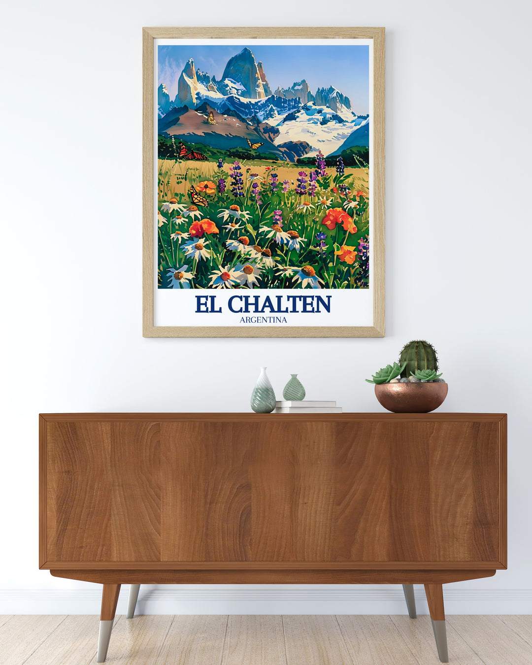 Celebrate the breathtaking beauty of El Chaltén with this Travel Poster. The print showcases Fitz Roy and Cerro Torre, making it a perfect addition to any space for those who love the outdoors.