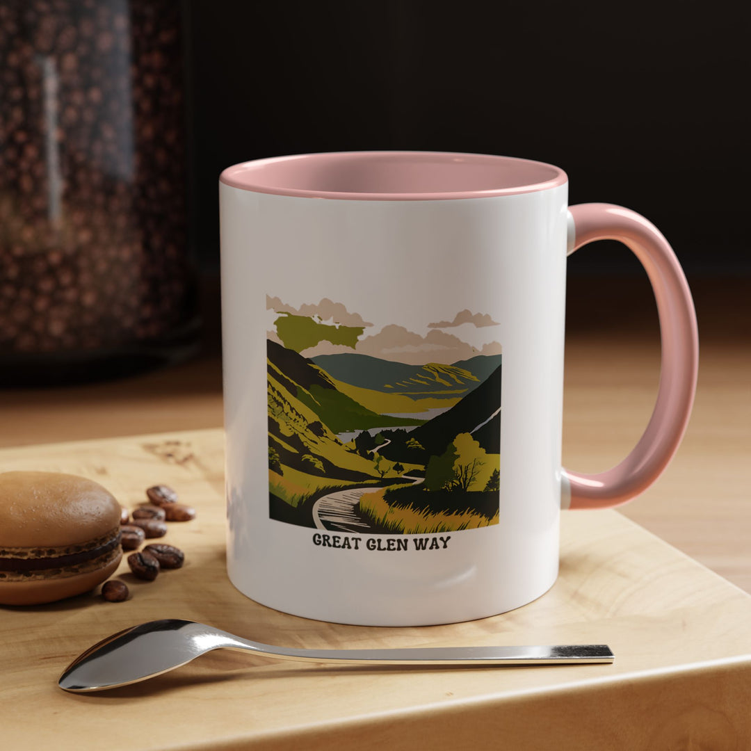 A charming Great Glen Way mug featuring vibrant artwork of Scotland’s scenic hiking trail. Made from durable ceramic, it is both dishwasher-safe and microwave-safe, perfect for enjoying your favorite hot drinks while admiring the beauty of the Great Glen Way.