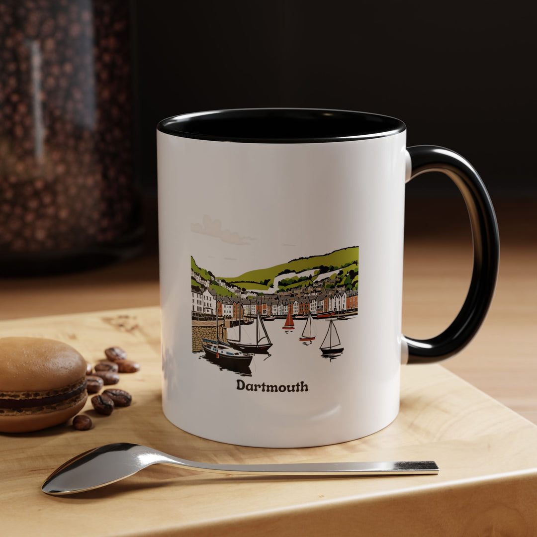 A stunning Dartmouth Mug featuring colorful artwork inspired by the picturesque charm of Dartmouth’s landscapes and landmarks. This dishwasher-safe ceramic mug is perfect for coffee lovers and art enthusiasts looking for a stylish keepsake.