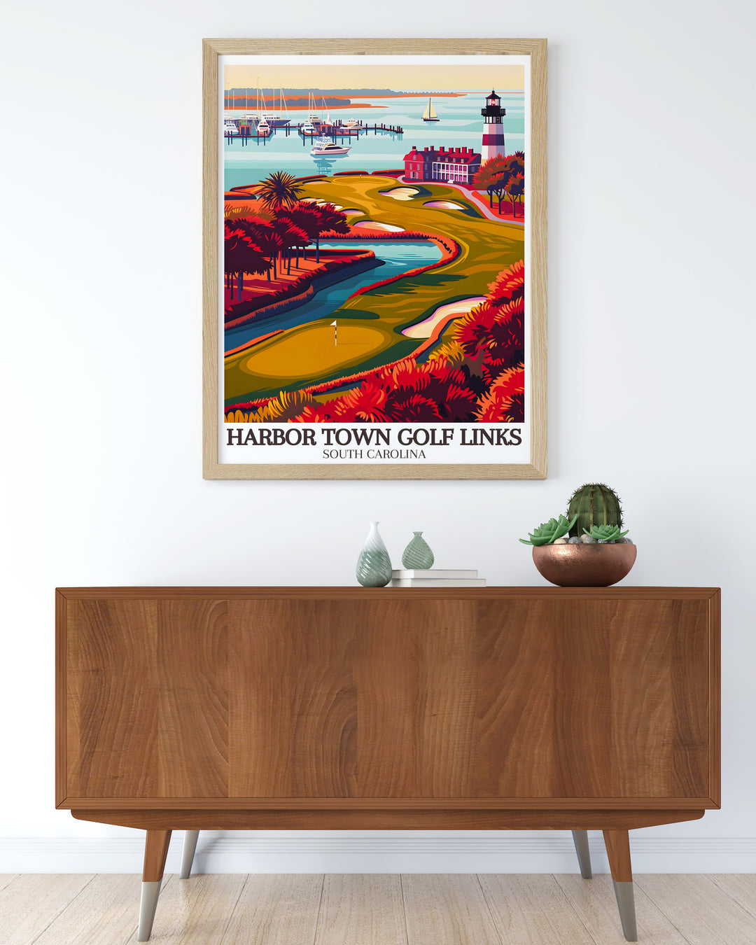 This Harbor Town poster print captures the iconic 18th hole at Harbor Town Golf Links with stunning detail. The vibrant colors and scenic backdrop of the Sea Pines Resort make this travel print a must have for golf lovers and those who admire coastal beauty.