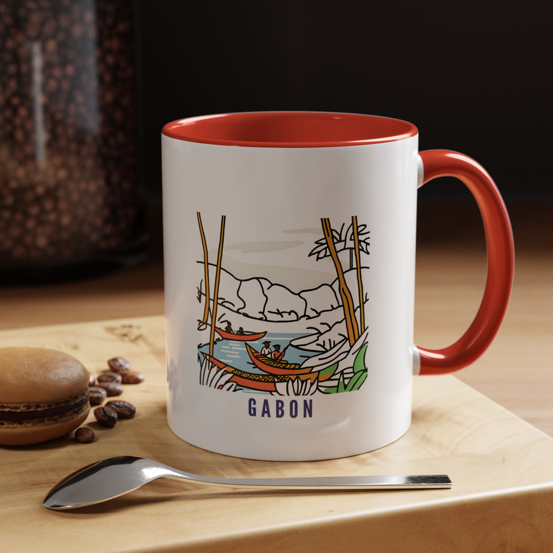 Enjoy a connection to Gabon’s beauty with this elegant mug featuring detailed artwork of the country’s cultural charm. Crafted from durable ceramic, it is dishwasher-safe and perfect for coffee or tea enthusiasts or as a meaningful gift.