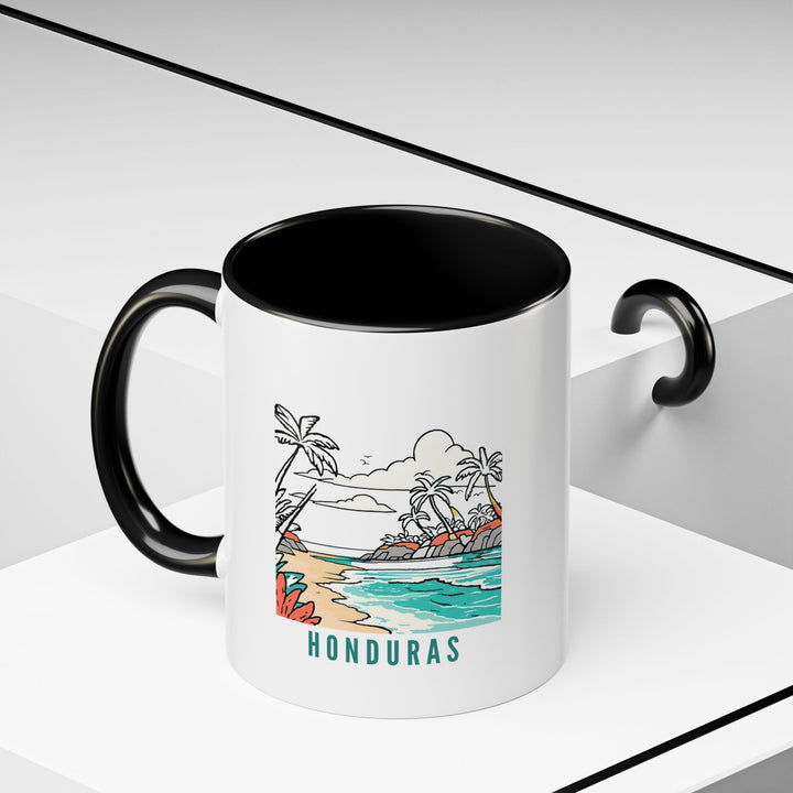 This ceramic Honduras mug highlights the country's heritage with intricate designs. Perfect for coffee or tea, it is durable and dishwasher-safe, offering a stylish and functional addition to any kitchen.