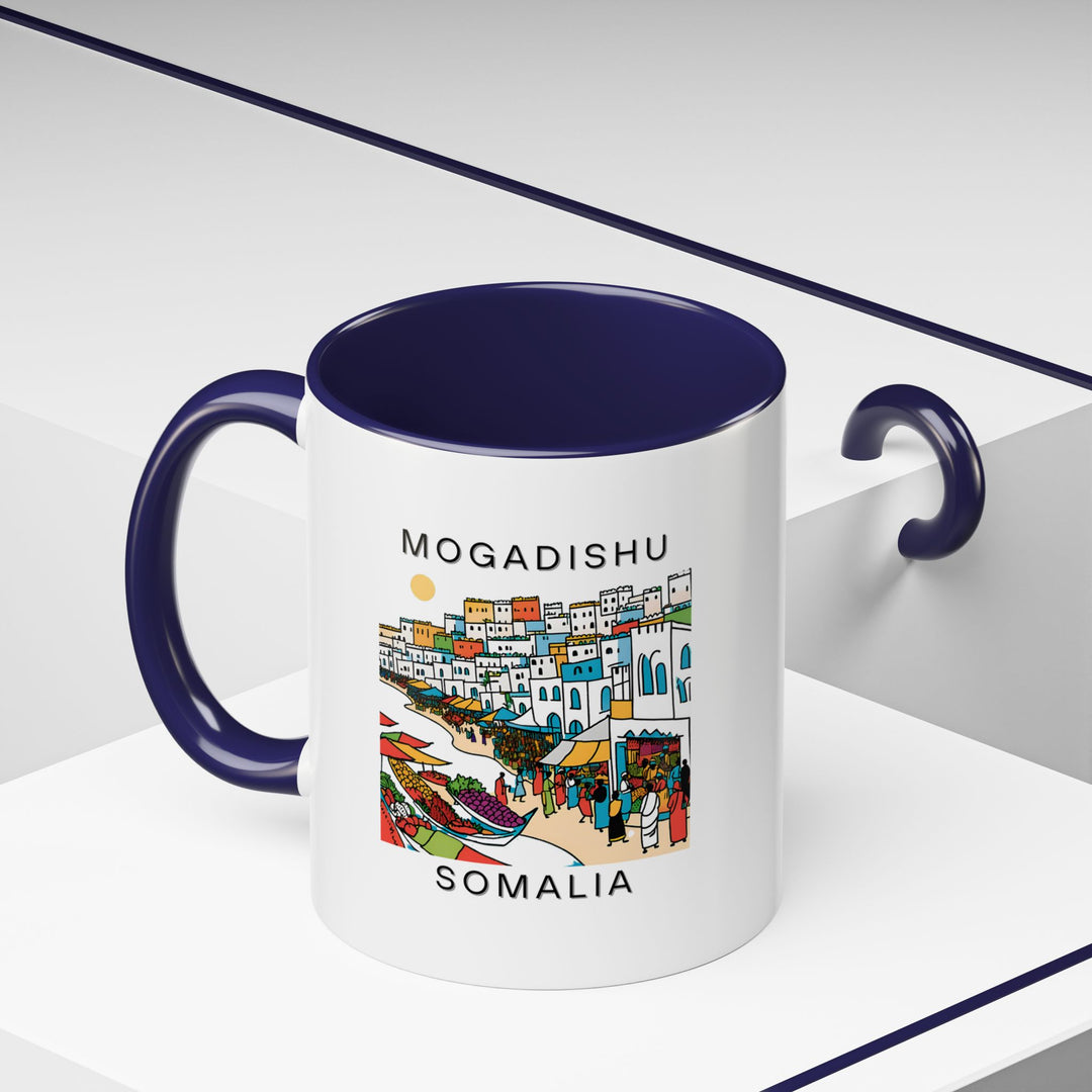 A charming Mogadishu Somalia mug that features detailed illustrations of the city’s most iconic spots. Ideal for coffee and tea lovers, this mug is dishwasher safe and serves as a meaningful keepsake for anyone with a love for Somali culture.