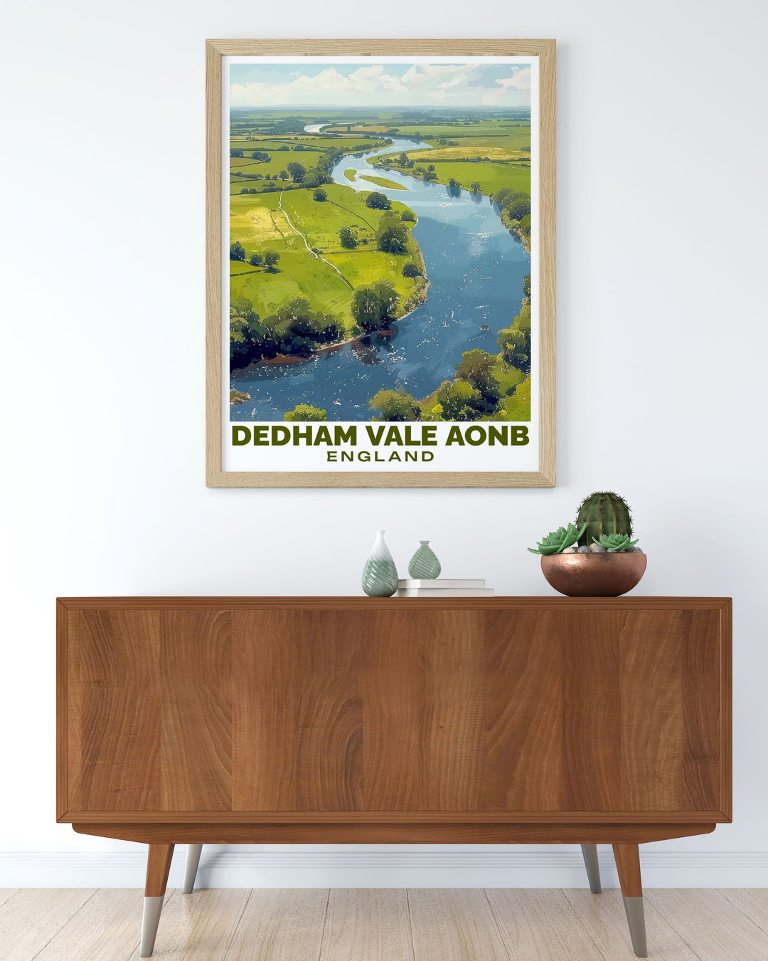 This Dedham Vale travel print highlights the peaceful terrain and the meandering Stour River, offering a stunning view of the British countryside. Perfect for home décor or as a travel inspired gift, this print adds a touch of countryside elegance to any space.