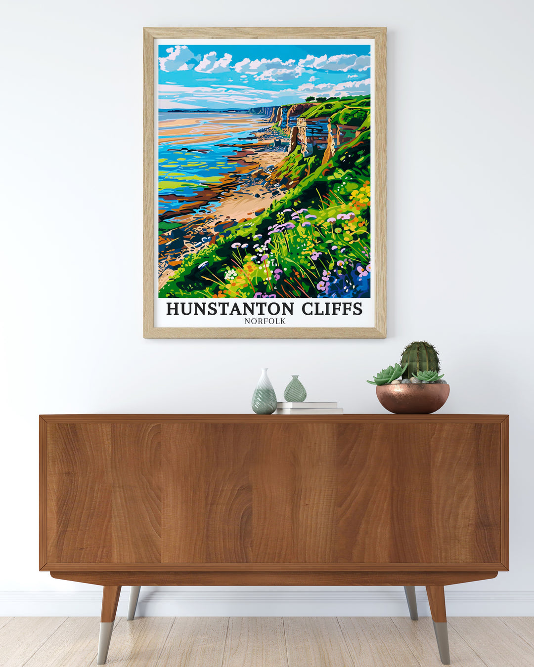 Hunstanton Beach travel print highlighting the peaceful beauty of this family friendly beach. The artwork captures the soft sands and gentle waves at sunset, making it an ideal addition for those seeking a tranquil, seaside atmosphere in their home décor.