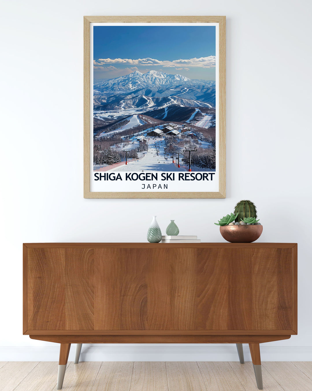 Featuring the majestic Japanese Alps, this poster showcases the serene yet thrilling landscape of Shiga Kogen, inviting viewers to explore the natural beauty and adventure of Nagano, Japan.