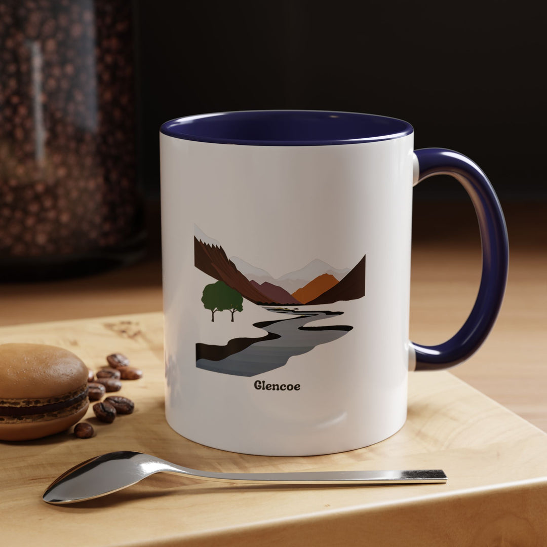 A striking Glencoe mug with detailed artwork of Scotland’s scenic landscapes. Designed for practicality and beauty, it features a colored rim and handle, making it a thoughtful gift or keepsake for Highland lovers.