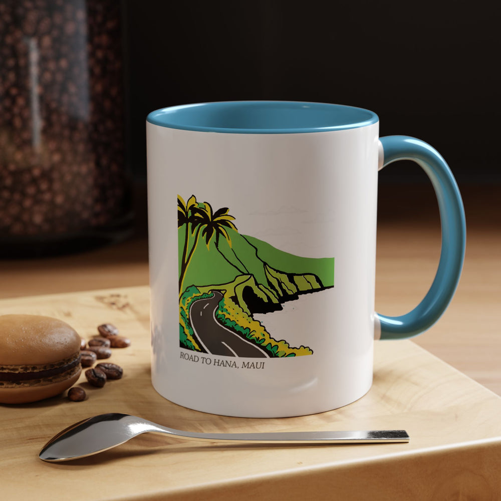 The Road to Hana, Maui mug features vibrant artwork of the lush landscapes and scenic coastlines along Maui’s famous route. Ideal for enjoying your favorite beverage, this durable mug brings the beauty of Hawaii to every sip.