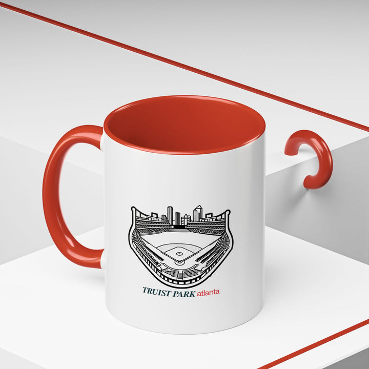 This Truist Park Atlanta Mug highlights beauty of stadium with detailed designs. Made from durable ceramic, dishwasher and microwave safe, it combines functionality with artistic expression for everyday enjoyment.