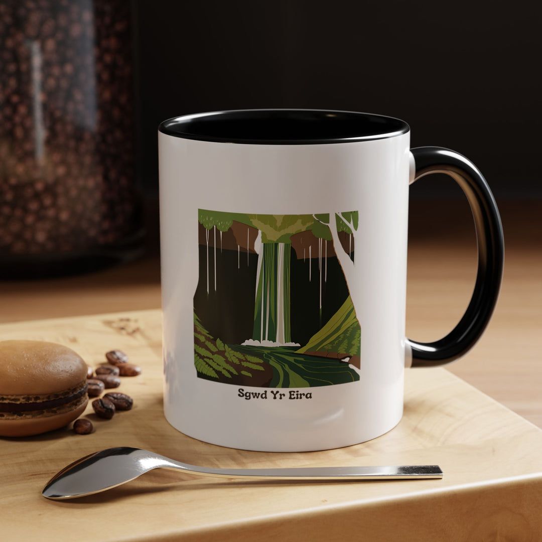 A beautifully designed Sgwd Yr Eira Waterfall Mug inspired by the iconic Welsh waterfall. Perfect for coffee or tea lovers, it combines artistic charm with practicality. Made from durable ceramic, it is dishwasher-safe and microwave-safe for daily convenience.