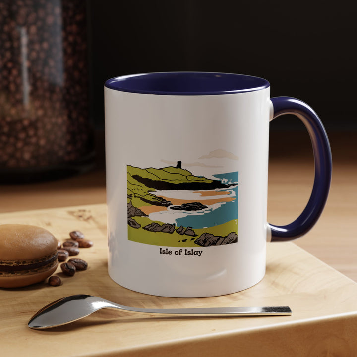 A beautifully designed Isle of Islay mug showcasing the stunning landscapes of Scotland’s iconic island. Perfect for coffee or tea lovers, this mug brings Islay’s charm to your daily routine. Durable, microwave-safe, and dishwasher-safe for everyday use.