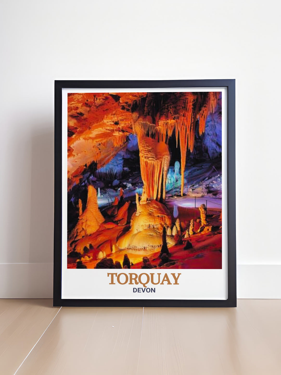 This vintage travel print features Torquay and Kents Cavern, showcasing the dramatic cliffs and prehistoric caves of Devon. Perfect for any traveler or history enthusiast, this artwork highlights the natural wonder and historical depth of the Devon coastline.