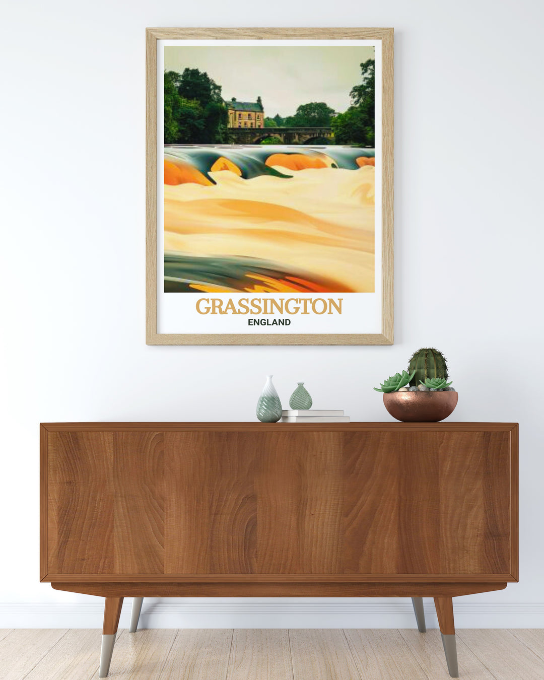 Our Grassington travel print is a celebration of one of Yorkshires most iconic villages. The artwork beautifully captures the villages stone buildings set against the lush backdrop of the Dales, offering a serene and peaceful image of English countryside living. Its a perfect gift for those who love Yorkshire and its historic charm.