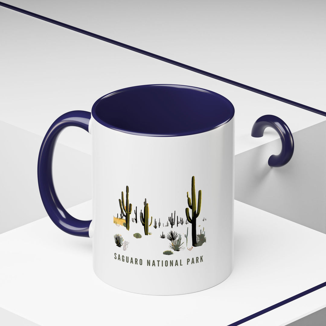 A premium Saguaro National Park mug designed for nature enthusiasts and travelers. Showcasing detailed artwork of saguaro cacti and desert scenes, it is dishwasher and microwave safe. An elegant gift or keepsake, perfect for those who appreciate southwestern charm.